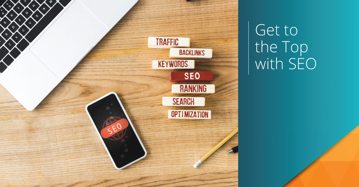 Computer and cellphone on table with blocks representing SEO best practices with text overlay 